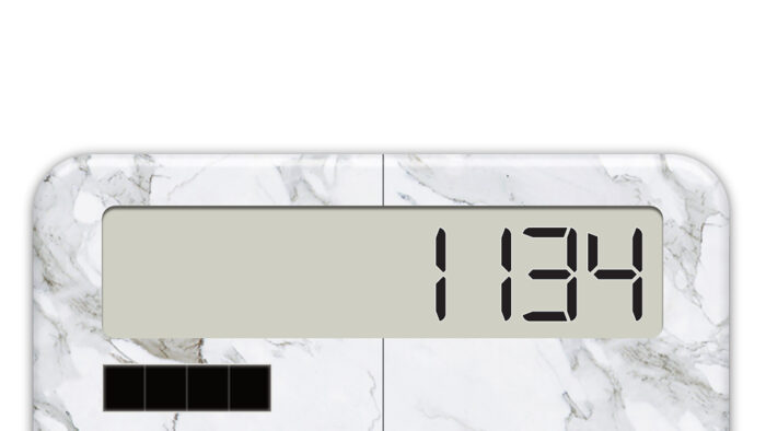 Numbers "1134" appear on a marbled calculator.